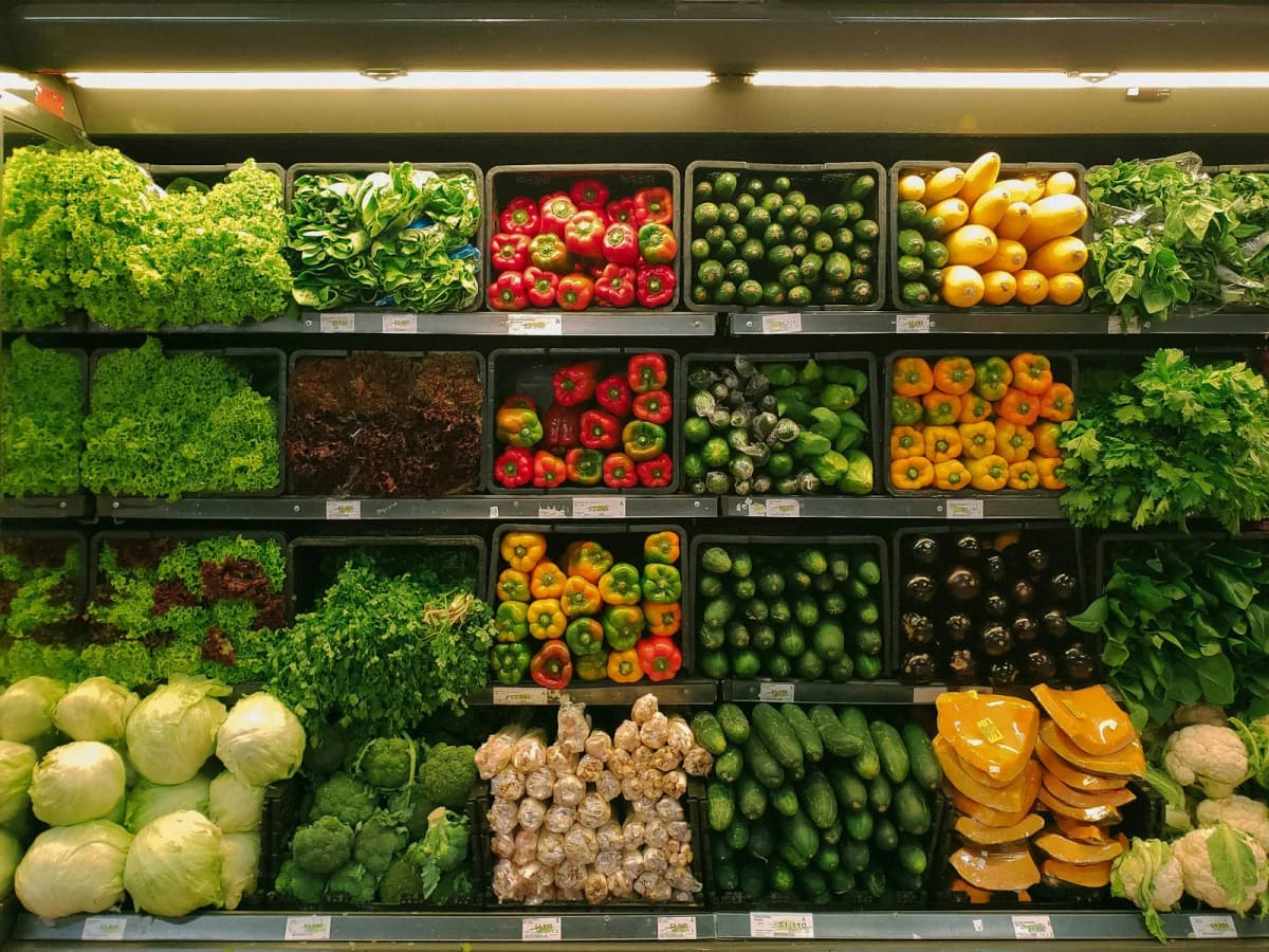 Fresh vegetables at a market for budget grocery shopping