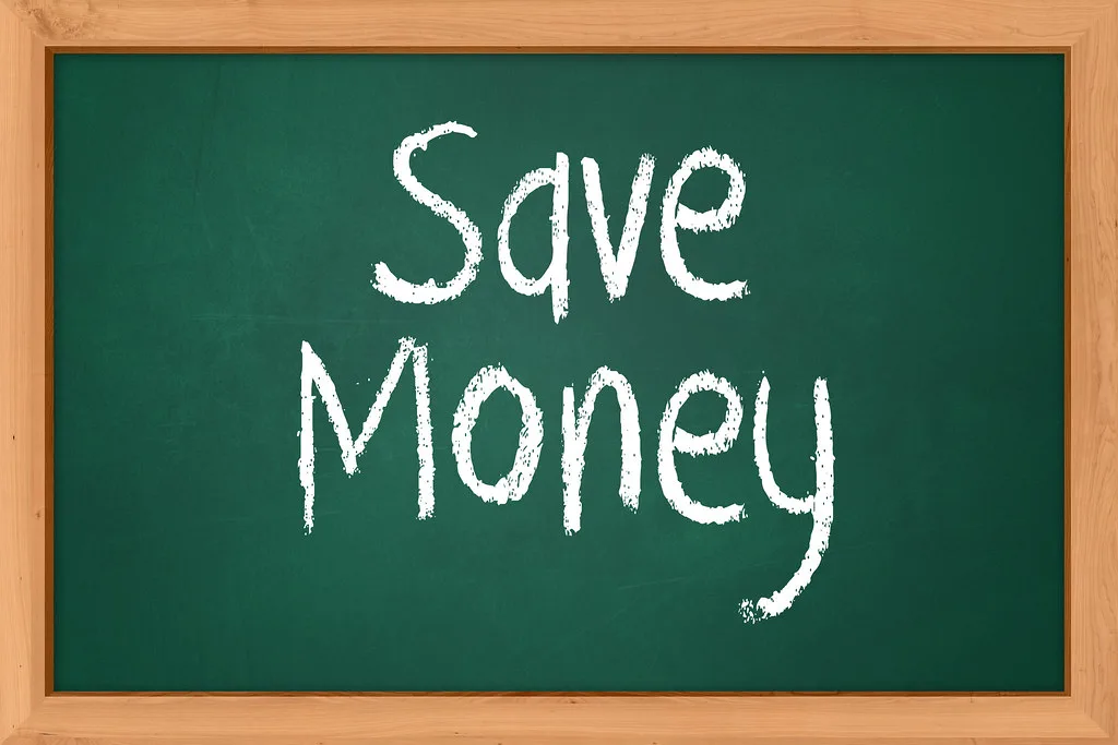 Saving money — coins and cash — UK Cost of Living Crisis 2026: 20 Ways British Families Are Surviving