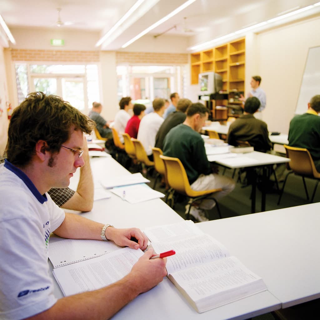 A college student studying on campus — 13 Safe Online Earning Ideas for Students in 2026