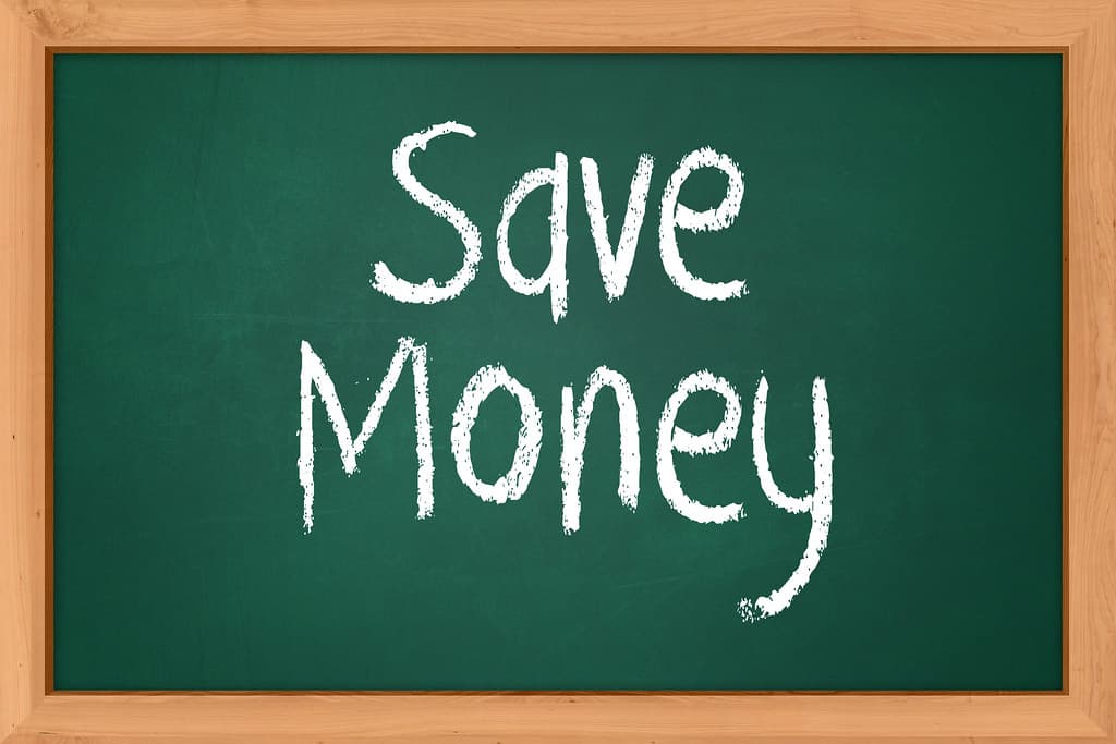 Saving money — coins and cash — UK Cost of Living Crisis 2026: 20 Ways British Families Are Surviving