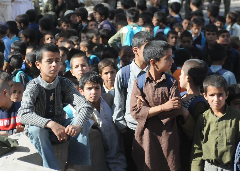 Receiving school supplies in Shindand